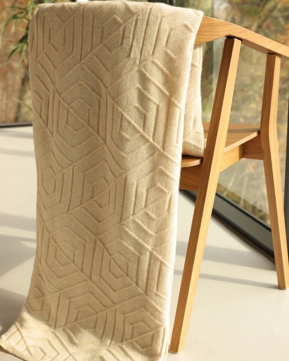 Cashmere Throw Blanket - Alashan Cashmere French Deco Knit in Dune in Window on Wood Chair
