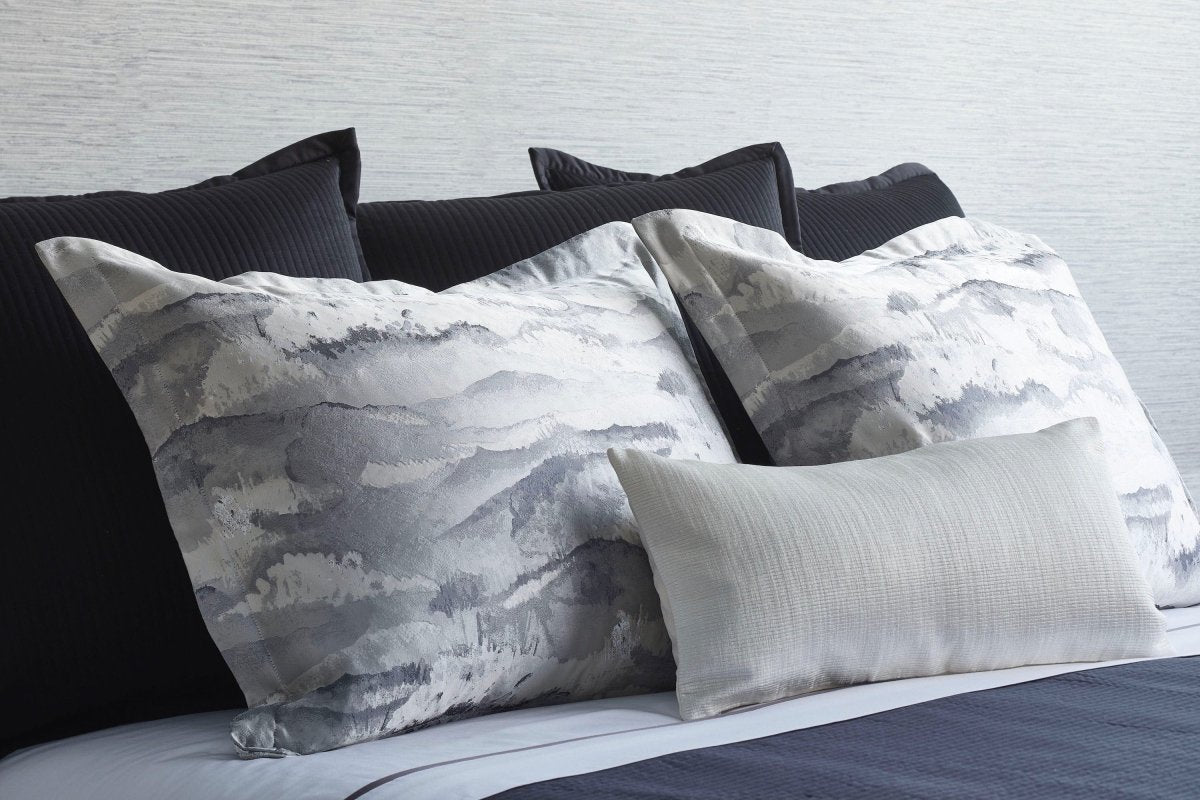 Linea Black Coverlet Set by Ann Gish - Detailed view of pillow shams with other decorative cushions