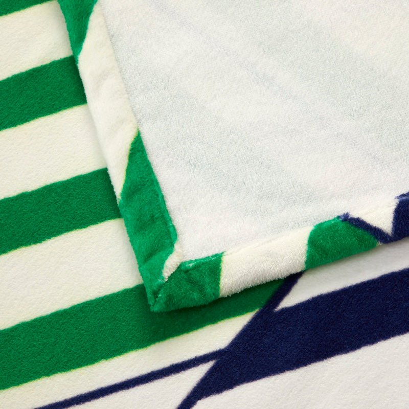 Corner detail of Yves Delorme Regates Beach Towel - Pool Towels at Fig Linens and Home