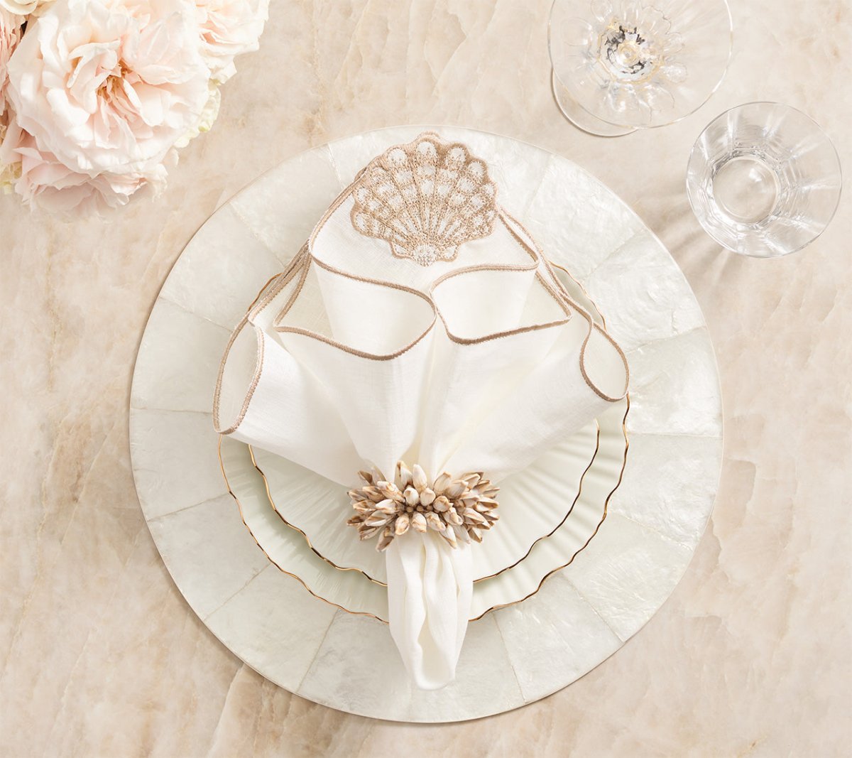 Beachcomber Napkins in White & Natural Set of 4 by Kim Seybert at Fig Linens and Home on Table