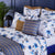 Yves Delorme Canopee Printed Counterpane shown on Luxury Bedding as the Bed runner