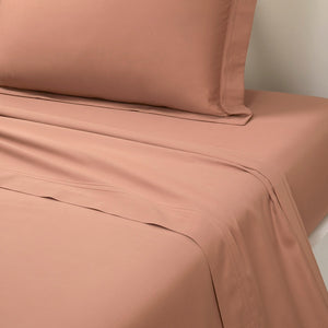 Flat Sheet on Bed - Triomphe Sienna Cotton Bedding by Yves Delorme at Fig Linens and Home
