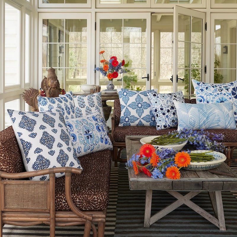 Sunporch with Outdoor Pillows on Rattan Furniture - John Robshaw Textiles