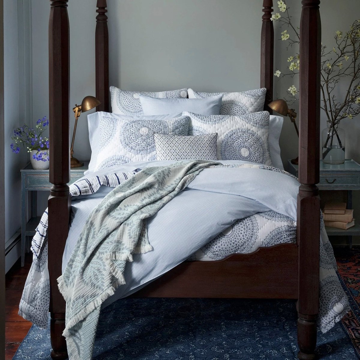 John Robshaw Textiles - Lifestyle Photo of Cinde Light Indigo Blue on Bed with Quilts and Shams 2