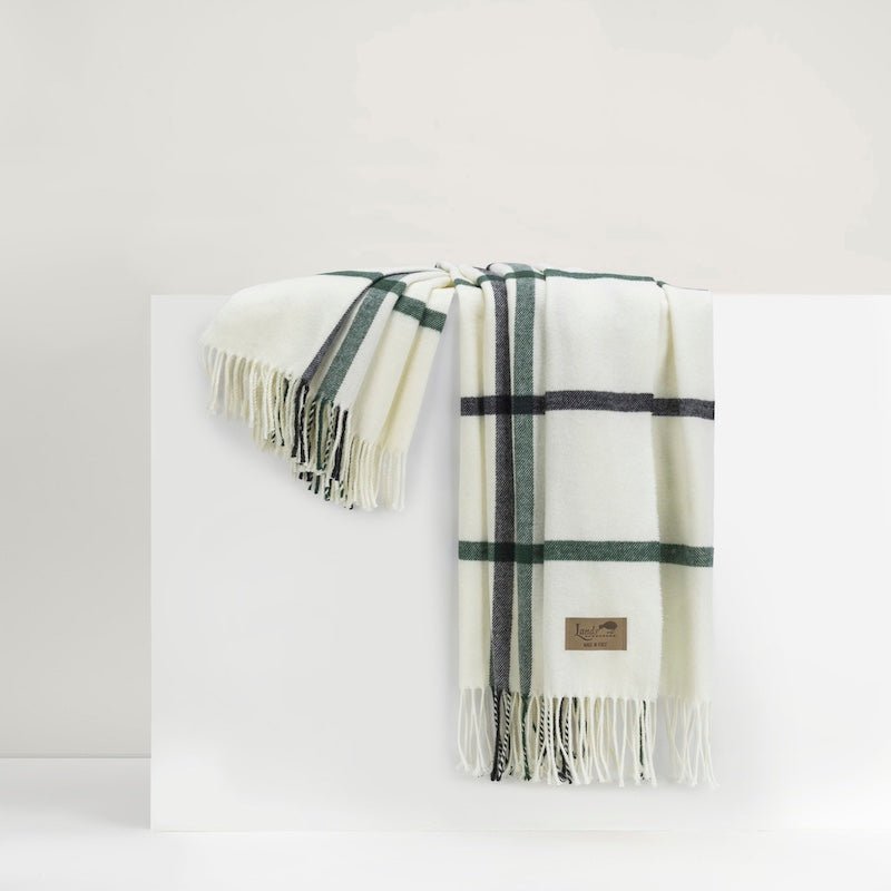 Lands Downunder Blanket - Pine and Graphite Tattersall Plaid Fringed Throw shown on Riser