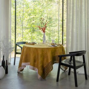 Souveraine Gold Tablecloth - Holiday Linens - Le Jacquard Francais with Ambience Setting and Flowers
