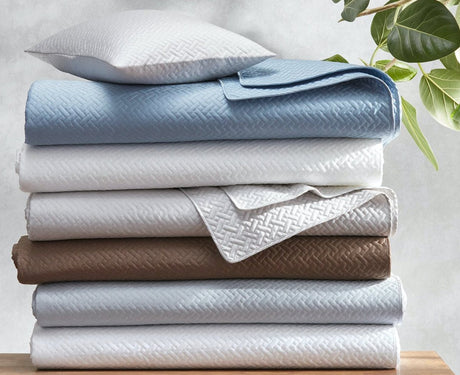Stack of Matouk Basketweave Quilts - all Colors at Fig Linens and Home