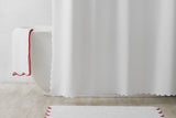 Matouk White Shower Curtain with Scalloped Edge shown with Tub Mat | Fig Linens and Home 1