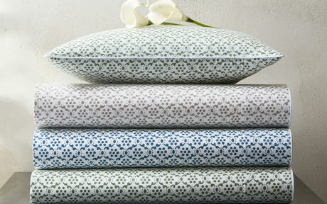 Laksha Flat Sheets by Matouk Schumacher at Fig Linens and Home | Stack of Printed Sheets