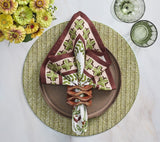 Oasis Napkin in Ivory Green & Brown Set of 4 by Kim Seybert shown on table