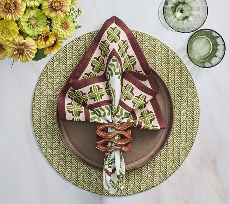 Oasis Napkin in Ivory Green & Brown Set of 4 by Kim Seybert shown on table