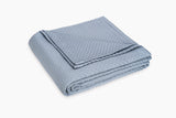 Perla Coverlet by Matouk in Hazy Blue at Fig Linens and Home