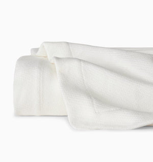 Allegra Blanket in Oyster by Sferra | Folded Cotton Blanket in Neutral Color 