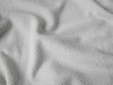 Swatch - Coyuchi Classic Organic Cotton Cloud Gray Blankets at Fig Linens and Home 1