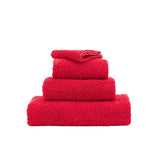 Abyss Super Pile Euro Guest Towel 17X24 Carmin 564 - View 1 at Fig Linens and Home
