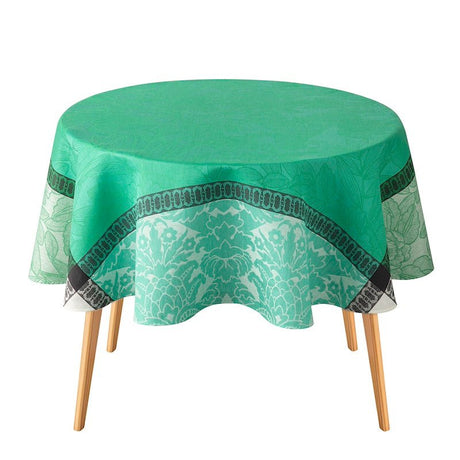 escapade tropicale green tablecloth by le jacquard français