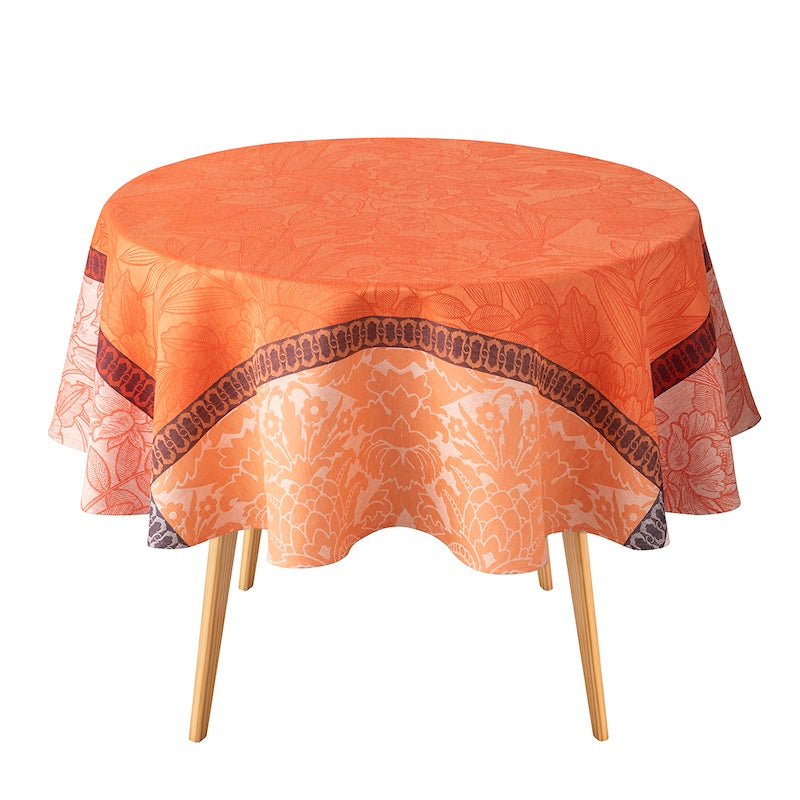 escapade tropicale orange tablecloth by le jacquard français - round table with tablecloth