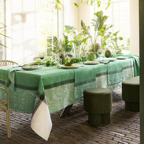 escapade tropicale green tablecloth by le jacquard français