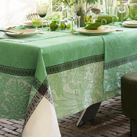 escapade tropicale green tablecloth by le jacquard français