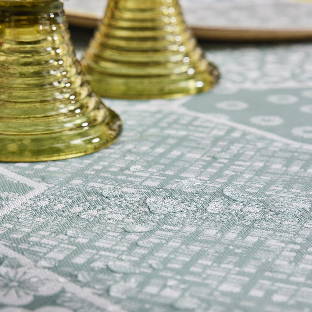 Wagara Green 59" x 59" Coated Tablecloth by Le Jacquard Français - 9at Fig Linens and Home - 3