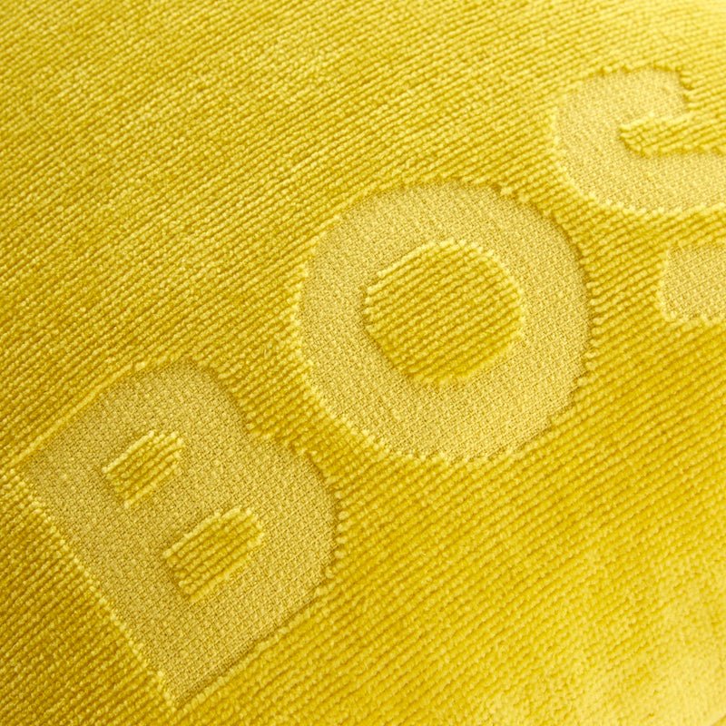 Zuma Acacia Beach Pillow by Hugo Boss Home - Embossed Letters on Yellow Outdoor Pool Pillow