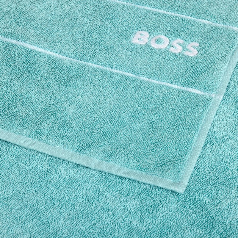 Detail of Bath Towels - Yves Delorme Plain Aruba Blue Towel by Hugo Boss Home - Fig Linens and Home