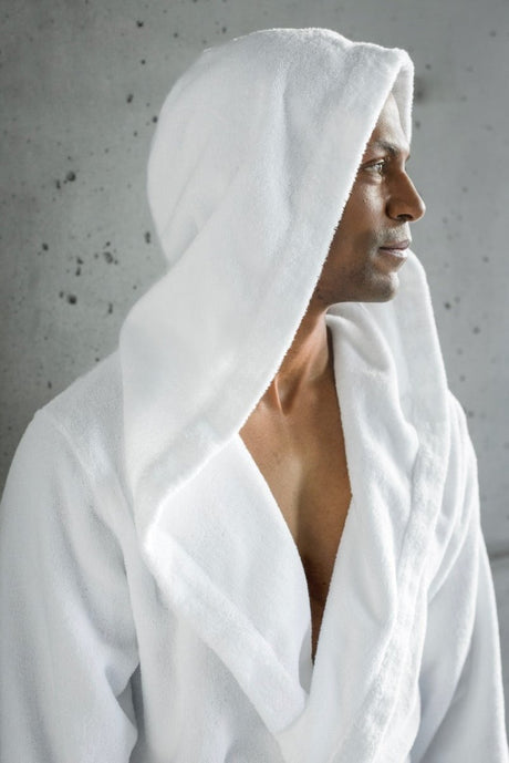 Abyss Habidecor Alex Bathrobe Hooded shown on Man White 100 Lifestyle Figlinensandhome 2