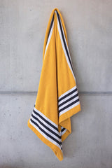 Abyss Cannes Beach Towel in Curcuma Yellow 870 at Fig Linens and Home - Pool Towel View 3