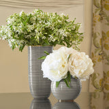 Calinda Tall Vase in Shadow by AERIN shown with Flowers and shorter version of Calinda