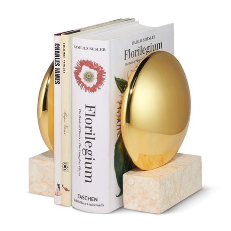 Constantin Bookends by AERIN shown Holding Books at Fig Linens and Home