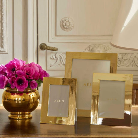 Lenora Frame 8 x 10 by AERIN at Fig Linens and Home | Lifestyle Image of Photo Frames in Gold Finish