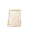 Piero Leather Frame in Shadow White - 5X7 by AERIN Overall 6.1" x 8.1" x 0.9" for 5"x 7" Photo Shadow White at FIG LINENS AND HOME 1