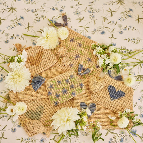 Small Heart Raffia Zip-Pouch in Denim Blue by AERIN at Fig Linens and Home - Lifestyle Photo