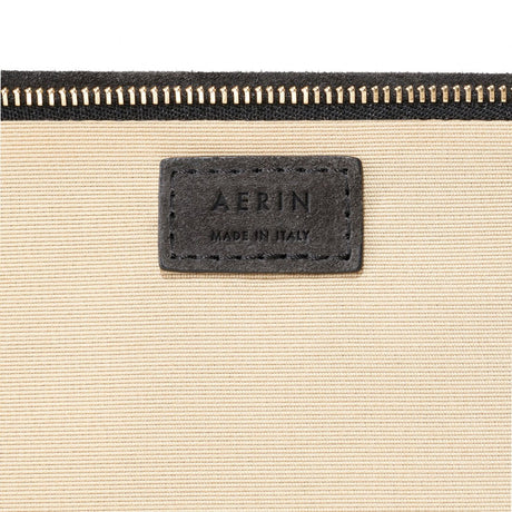 AERIN Suede Pouch in Dark Gray | Flat Clutch Bag at Fig Linens and Home - Logo View