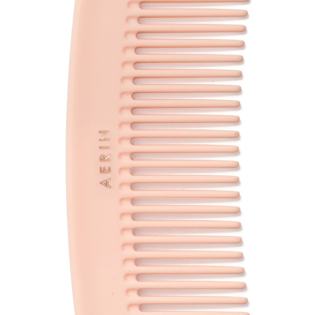 Travel Pink Pastel Comb by AERIN - Detail View of Logo at Fig Linens and Home