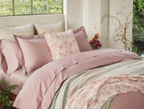 Balboa Organic Matelasse Print Decorative Pillow Cover by Coyuchi - Lifestyle on Bed
