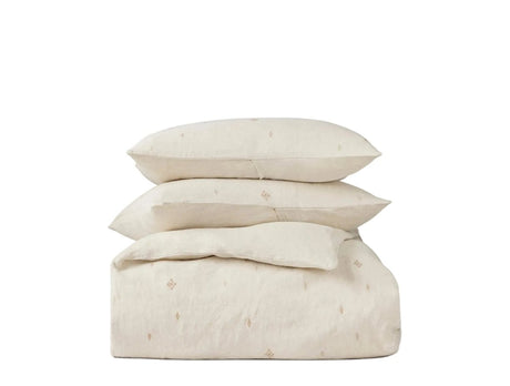 Stack of Duvet & Shams - Coyuchi Cambria Embroidered Organic Linen Natural Chambray Bedding