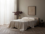 Coyuchi Cascade Organic Matelasse Blankets at Fig Linens and Home - Lifestyle View 1