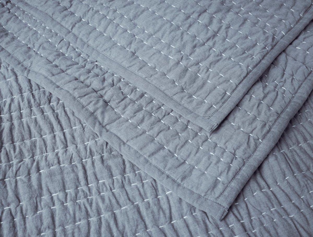 Coyuchi Channel Handstitched Organic Quilted Coverlets - Indigo Chambray at Fig Linens and Home 1