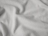 Swatch - Coyuchi Classic Organic Cotton Cloud Gray Blankets at Fig Linens and Home 1