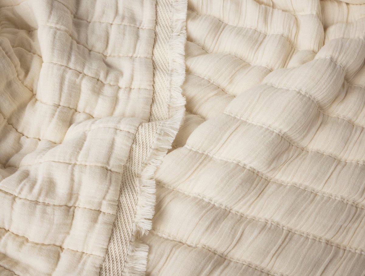 Coyuchi Dreamweight Organic Weighted Throw Blanket at Fig Linens and Home - Detail View 1