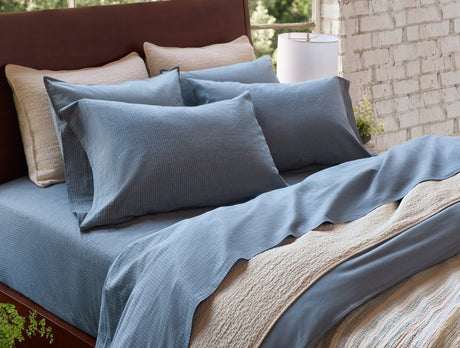 Organic Crinkled Percale Indigo Chambray Stripe Sheet Set Styled Room View | Coyuchi at Fig Linens and Home