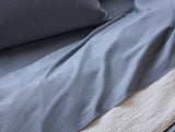 Organic Crinkled Percale Indigo Chambray Stripe Sheet Set Styled Room View 2 | Coyuchi at Fig Linens and Home