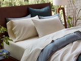 Organic Crinkled Percale Undyed w/ Indigo Gray Sheet Set Styled Room View | Coyuchi at Fig Linens and Home