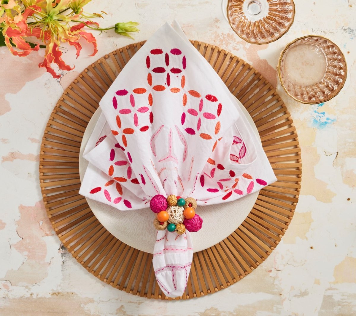 Malta Napkin in White, Pink & Orange by Kim Seybert at Fig Linens and Home 1