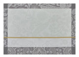 Voyage Iconique Enduit Grey Coated Placemat By Le Jacquard Francais at Fig Linens and Home 1