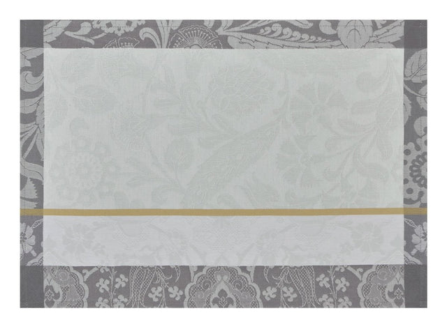 Voyage Iconique Enduit Grey Coated Placemat By Le Jacquard Francais at Fig Linens and Home 1