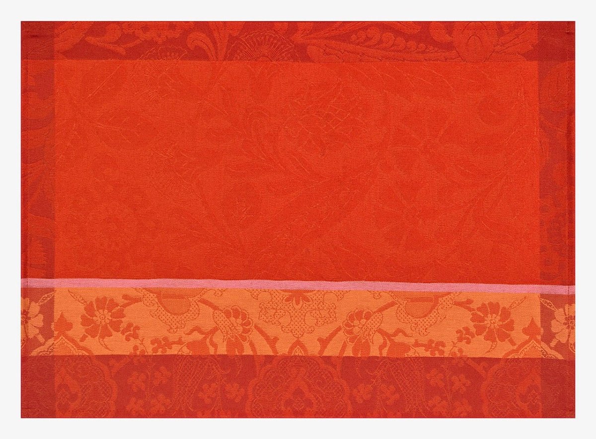 Voyage Iconique Enduit Red Coated Placemat by Le Jacquard Francais at Fig Linens and Home