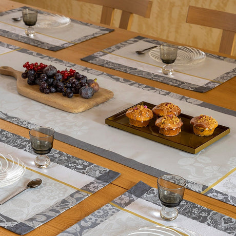 Voyage Iconique Grey Table Runner by Le Jacquard Francais at Fig Linens and Home - Lifestyle View