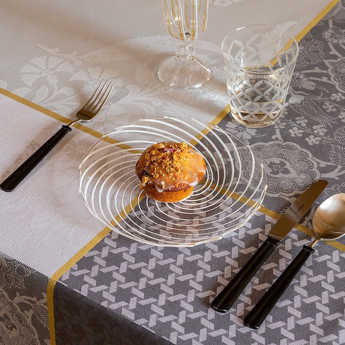Voyage Iconique Grey Tablecloth By Le Jacquard Francais at Fig Linens and Home - Lifestyle 2